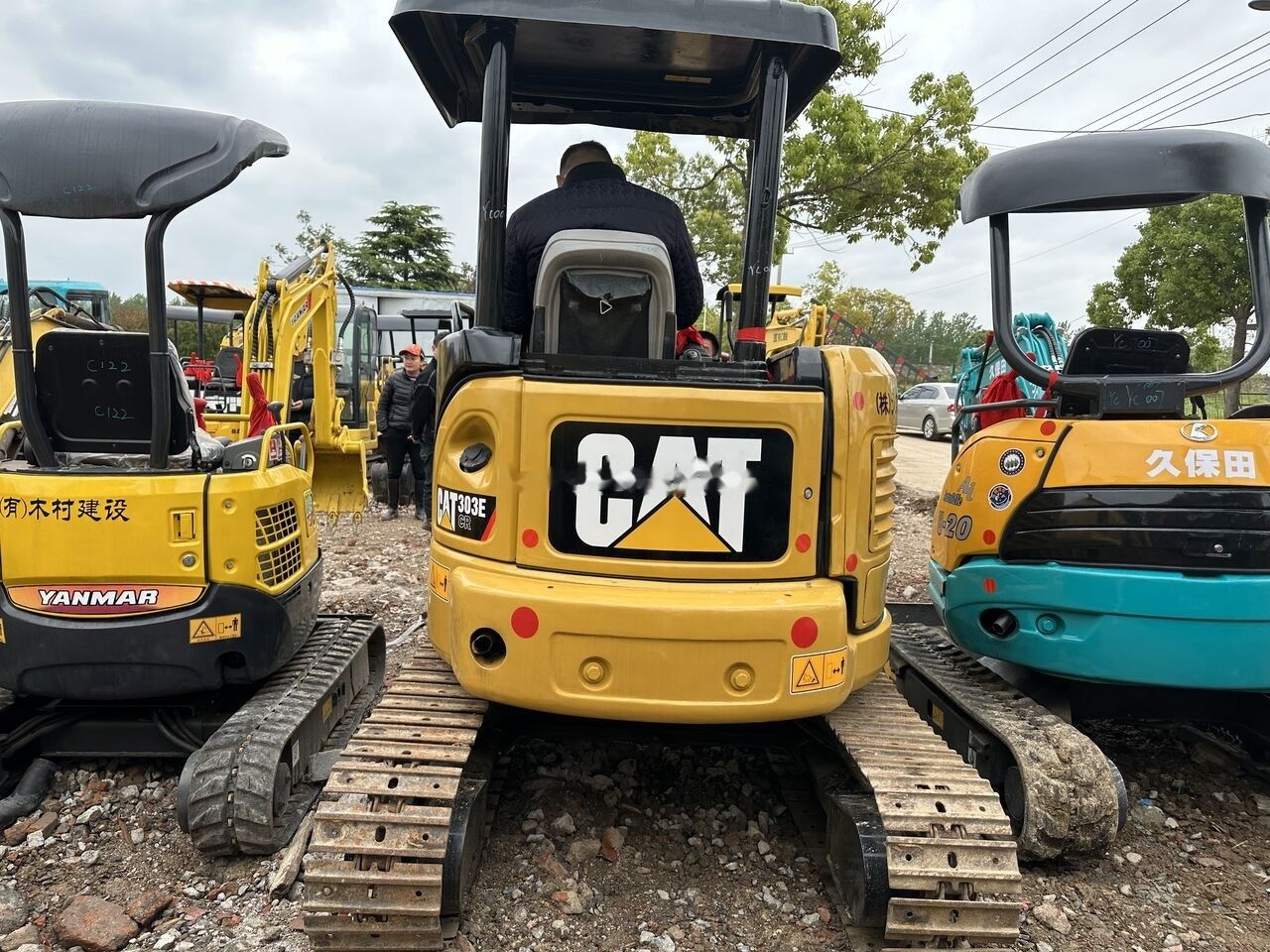 Caterpillar 303E mini excavator, rear view Caterpillar 303E mini excavator, rear view