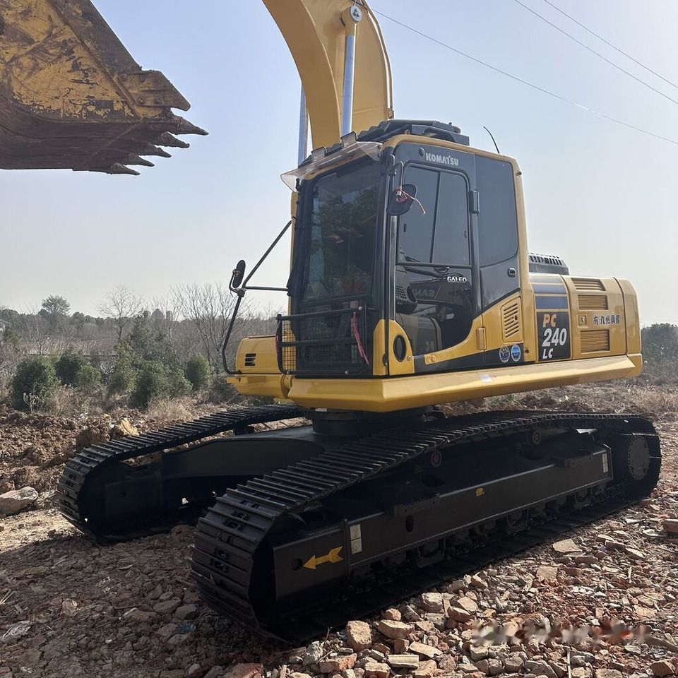 Komatsu PC240LC-8 crawler excavator, side view Komatsu PC240LC-8 crawler excavator, side view