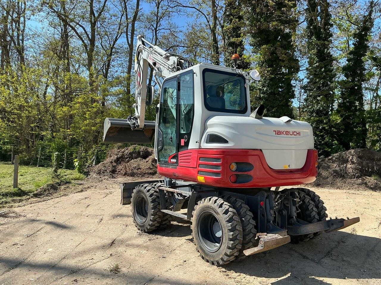 2018 Takeuchi TB295W wheel excavator, rear three-quarter view 2018 Takeuchi TB295W wheel excavator, rear three-quarter view
