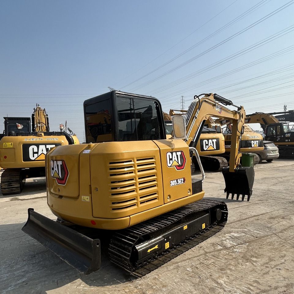 2023 Caterpillar 305.5E2 mini excavator rear three-quarter view