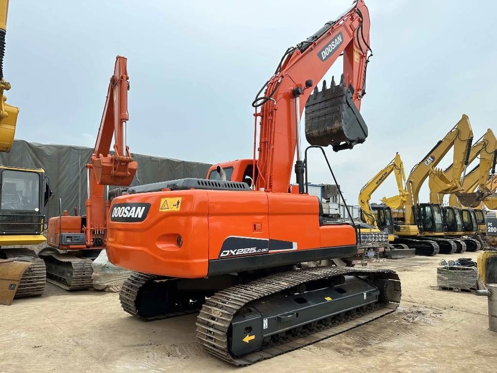 2023 Doosan DX225LC-9C crawler excavator rear three-quarter view