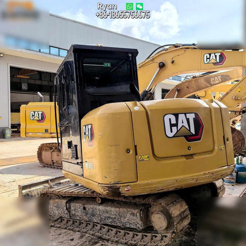 2022 Caterpillar 305.5E2 mini excavator, rear three-quarter view 2022 Caterpillar 305.5E2 mini excavator, rear three-quarter view