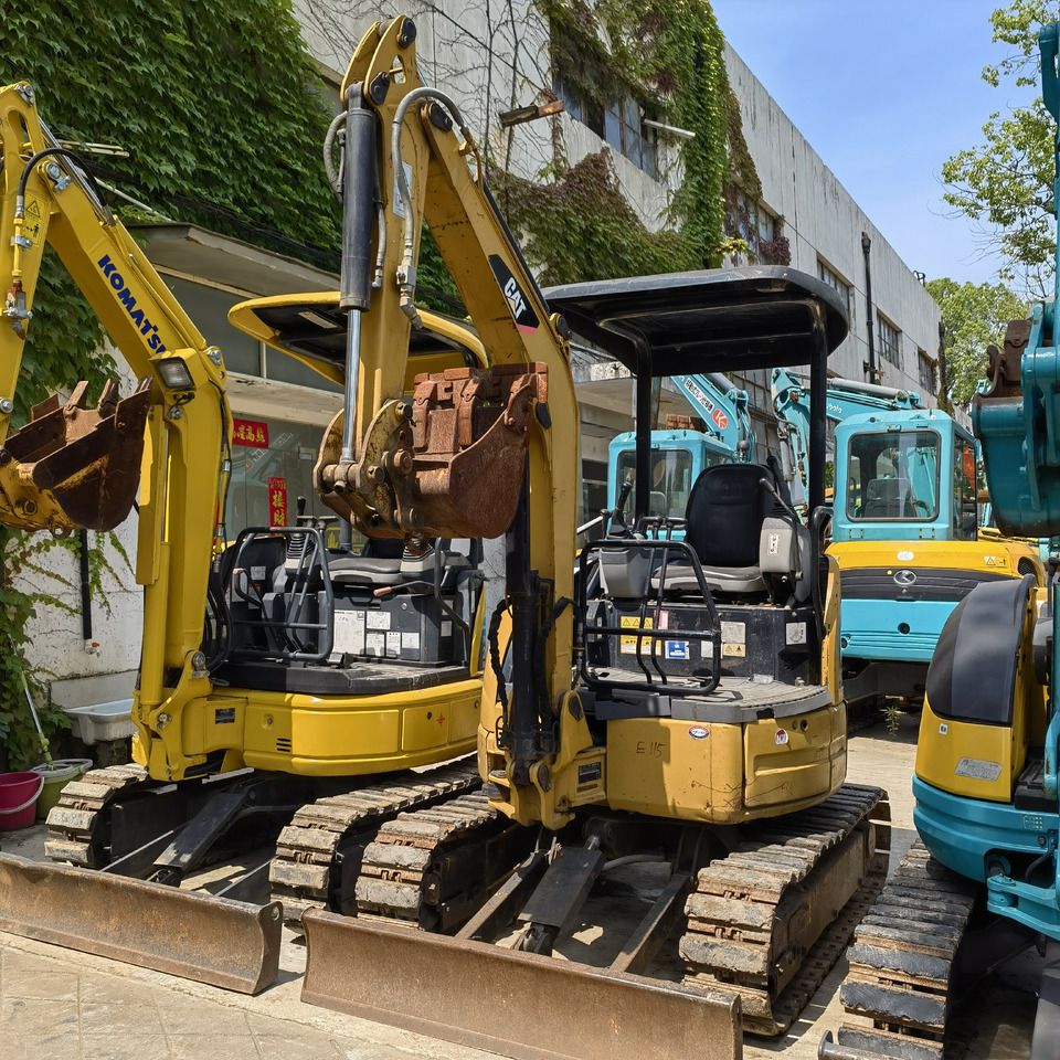 2022 Caterpillar 302C mini excavator, front three-quarter view 2022 Caterpillar 302C mini excavator, front three-quarter view
