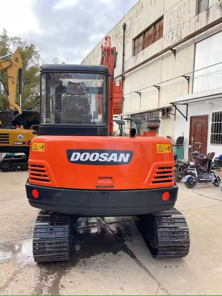 2023 Doosan DX55-9C mini excavator, rear view 2023 Doosan DX55-9C mini excavator, rear view