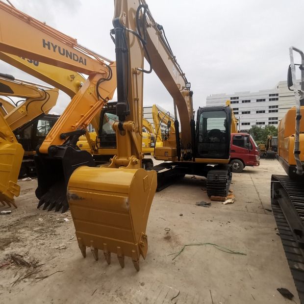 2021 Caterpillar 313D crawler excavator, front view 2021 Caterpillar 313D crawler excavator, front view