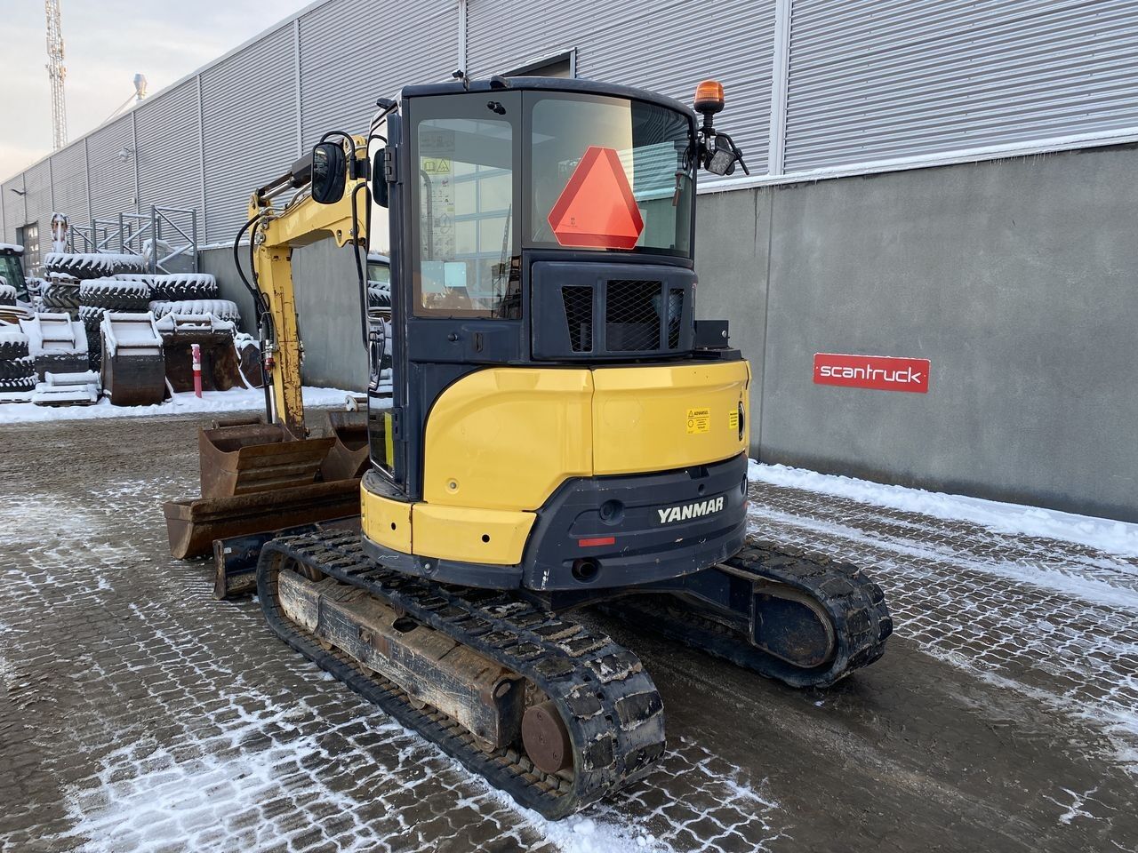 2017 Yanmar VIO50-6 mini excavator, rear three-quarter view 2017 Yanmar VIO50-6 mini excavator, rear three-quarter view