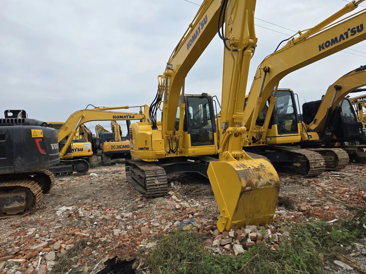 2023 Komatsu PC138US crawler excavator, front three-quarter view 2023 Komatsu PC138US crawler excavator, front three-quarter view