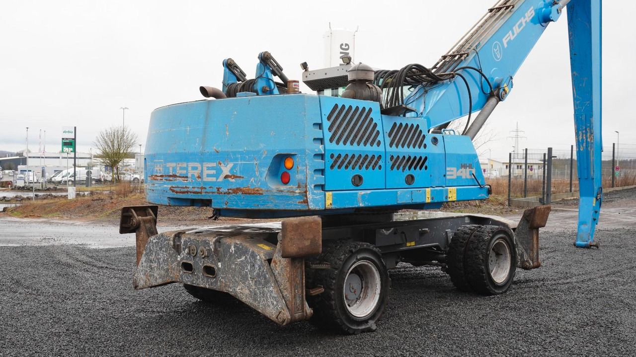 2017 Fuchs MHL340 wheel excavator, rear three-quarter view