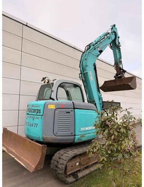 2003 Kobelco SK80MSR-1E mini excavator, rear three-quarter view