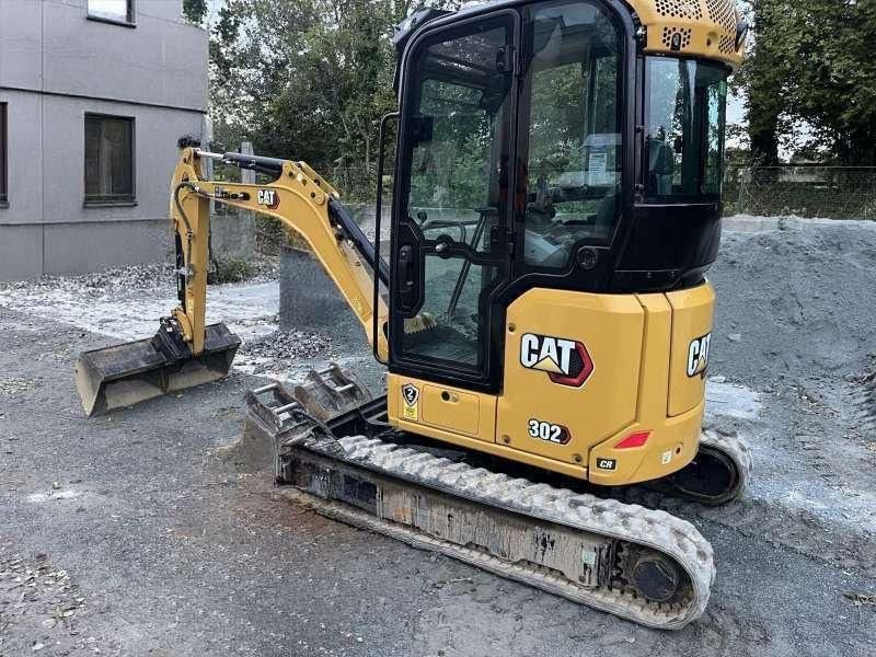 2023 Caterpillar 302 mini excavator, three-quarter view