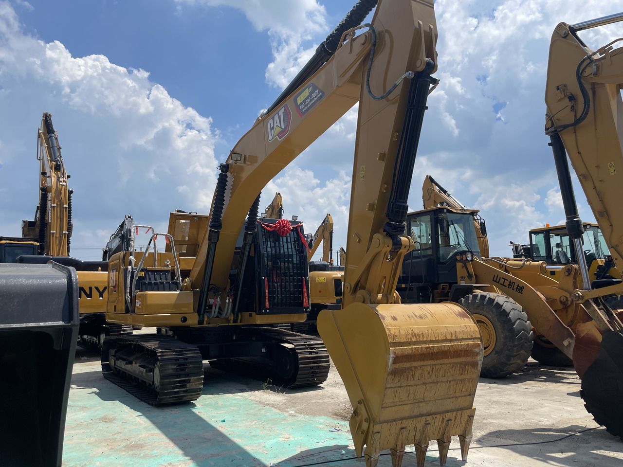 2023 Caterpillar 320GC crawler excavator, front three-quarter view 2023 Caterpillar 320GC crawler excavator, front three-quarter view