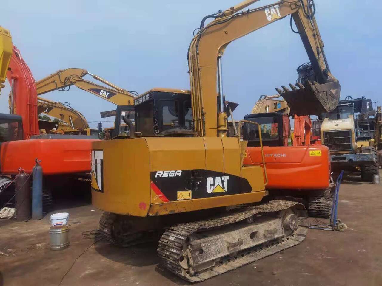2011 Caterpillar E70B crawler excavator, rear three-quarter view