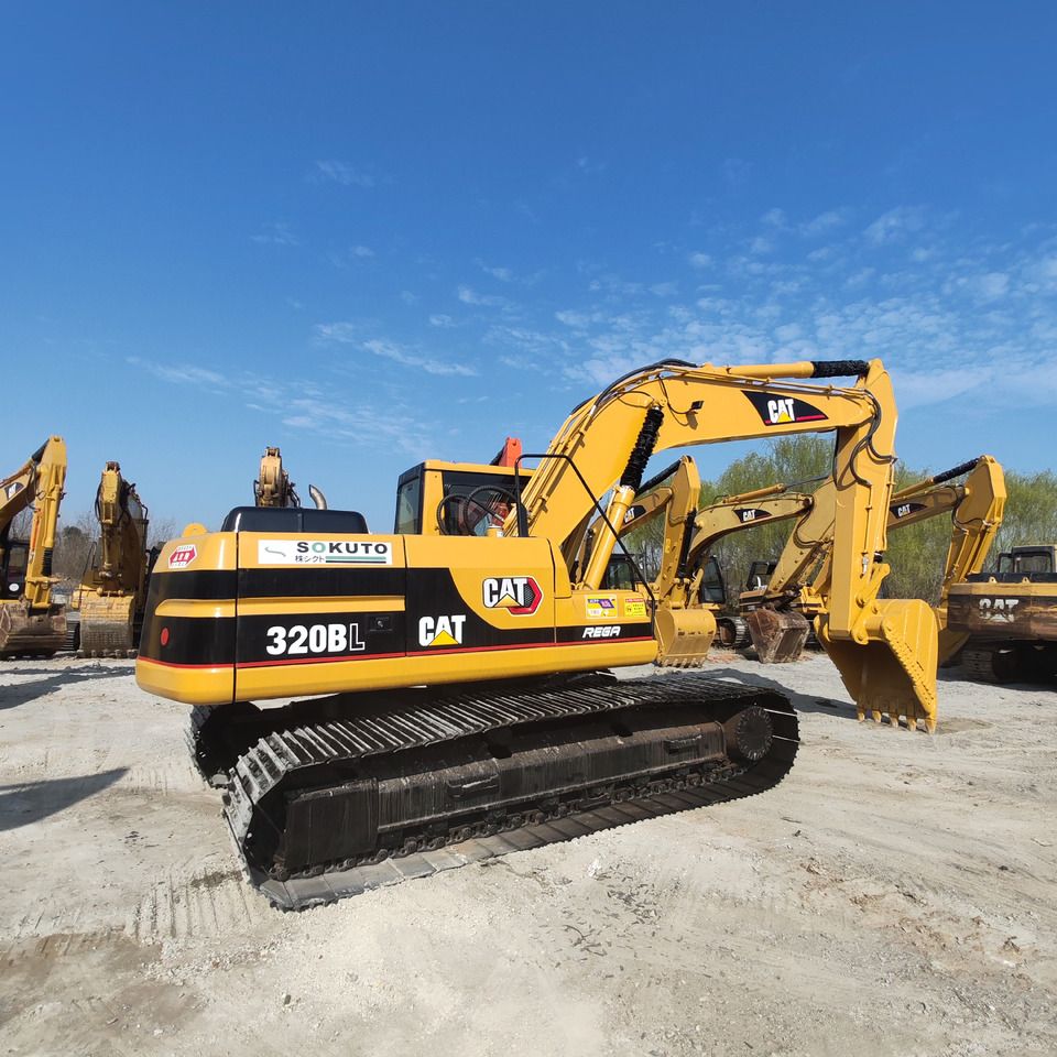 2018 Caterpillar 320BL crawler excavator, rear three-quarter view