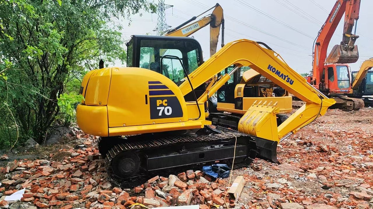 2023 Komatsu PC70 mini excavator, rear three-quarter view 2023 Komatsu PC70 mini excavator, rear three-quarter view