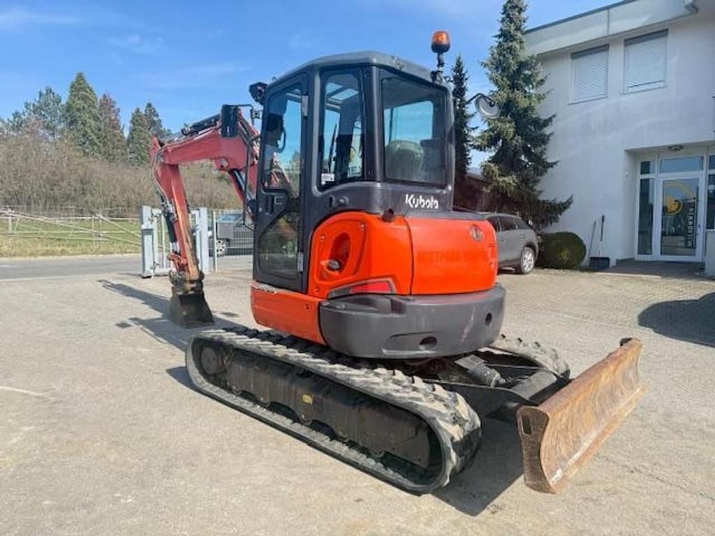 2016 Kubota U55-4 mini excavator, rear three-quarter view