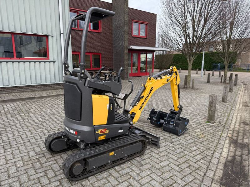 2025 New Holland E12D mini excavator, rear three-quarter view