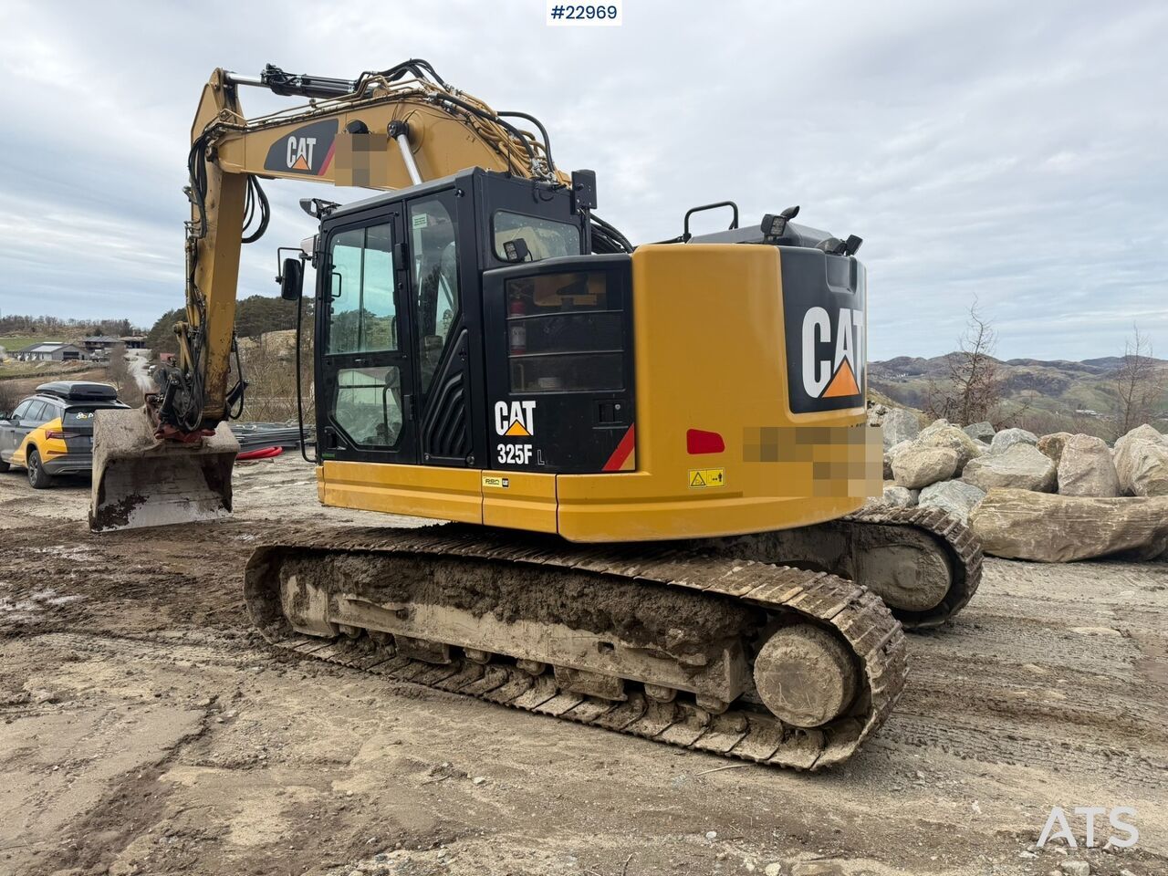 2018 Caterpillar 325FL crawler excavator, rear three-quarter view 2018 Caterpillar 325FL crawler excavator, rear three-quarter view