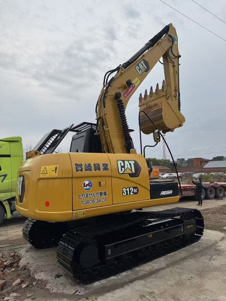 2022 Caterpillar 312 GC mini excavator, rear three-quarter view 2022 Caterpillar 312 GC mini excavator, rear three-quarter view