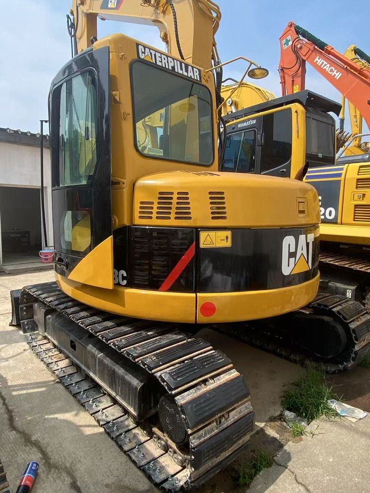 2021 Caterpillar 308C mini excavator, rear three-quarter view 2021 Caterpillar 308C mini excavator, rear three-quarter view