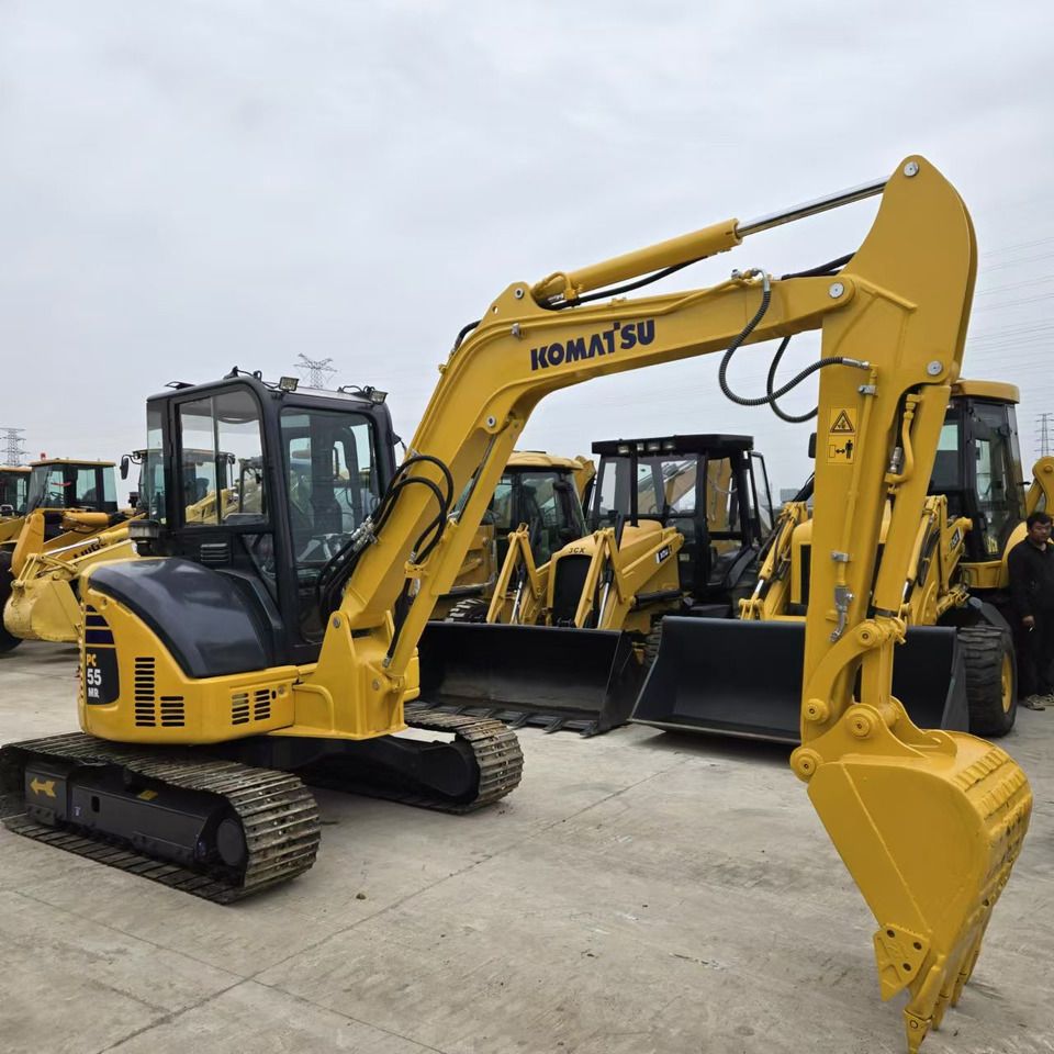 2023 Komatsu PC-55MR mini excavator, rear three-quarter view 2023 Komatsu PC-55MR mini excavator, rear three-quarter view
