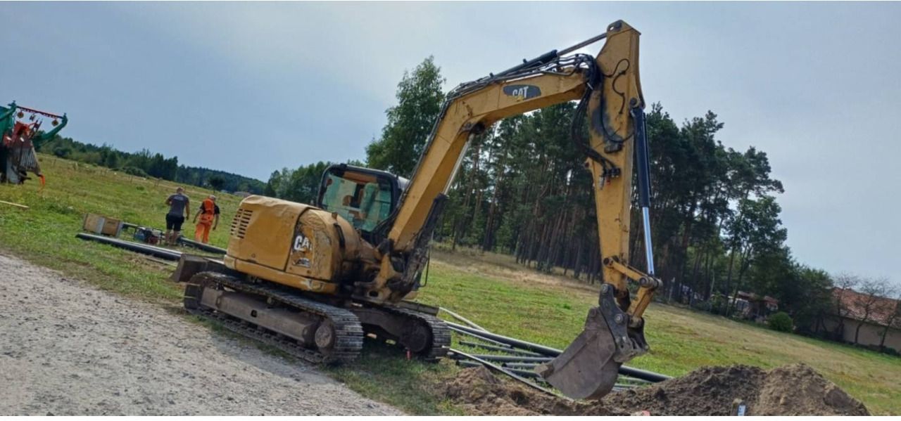 2013 Caterpillar 308E2CR crawler excavator, side view 2013 Caterpillar 308E2CR crawler excavator, side view
