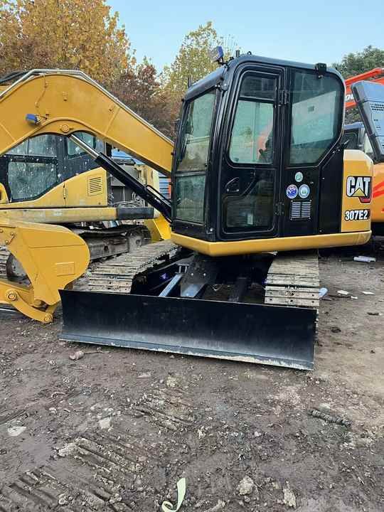 2023 Caterpillar 307E2 crawler excavator, front three-quarter view 2023 Caterpillar 307E2 crawler excavator, front three-quarter view