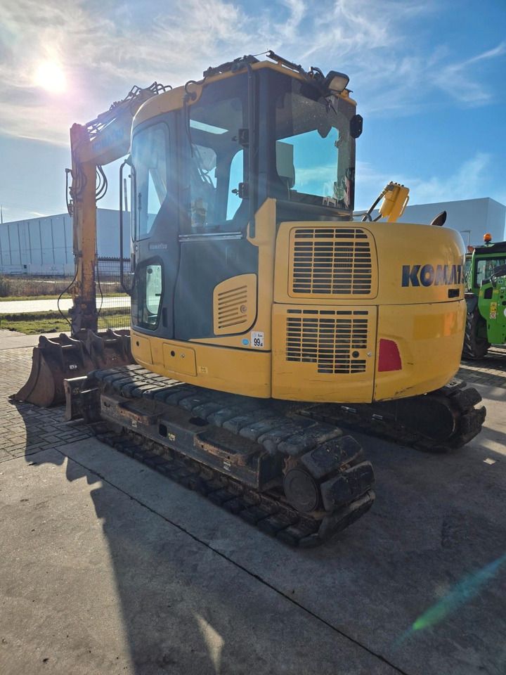 2016 Komatsu PC88MR-10 mini excavator, rear three-quarter view 2016 Komatsu PC88MR-10 mini excavator, rear three-quarter view