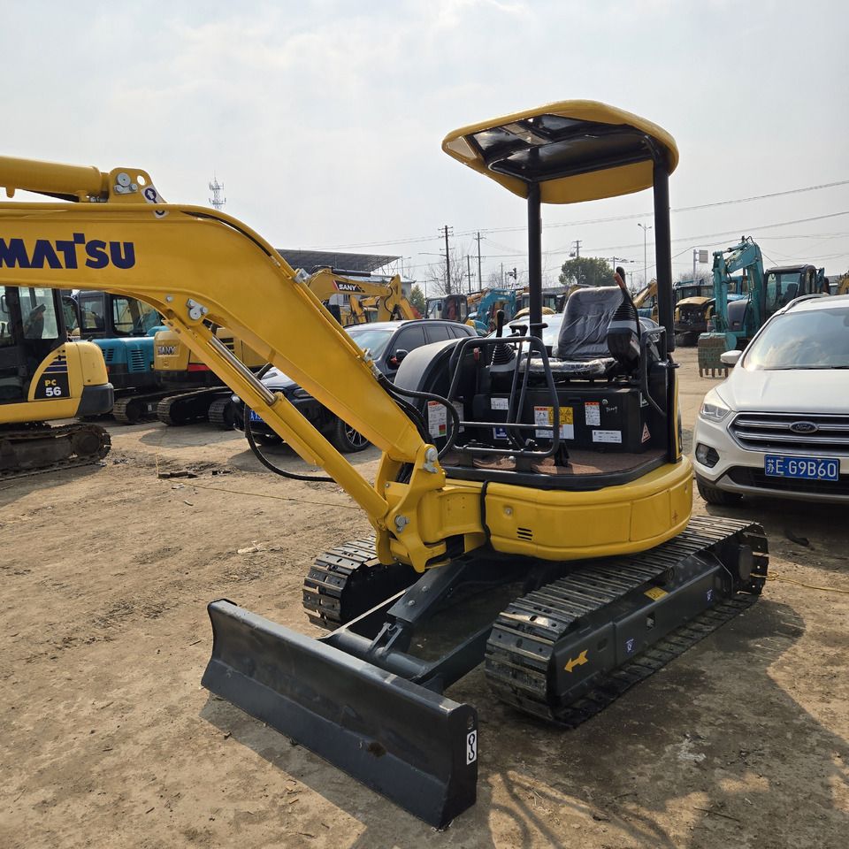 2023 Komatsu PC30 mini excavator, rear three-quarter view 2023 Komatsu PC30 mini excavator, rear three-quarter view