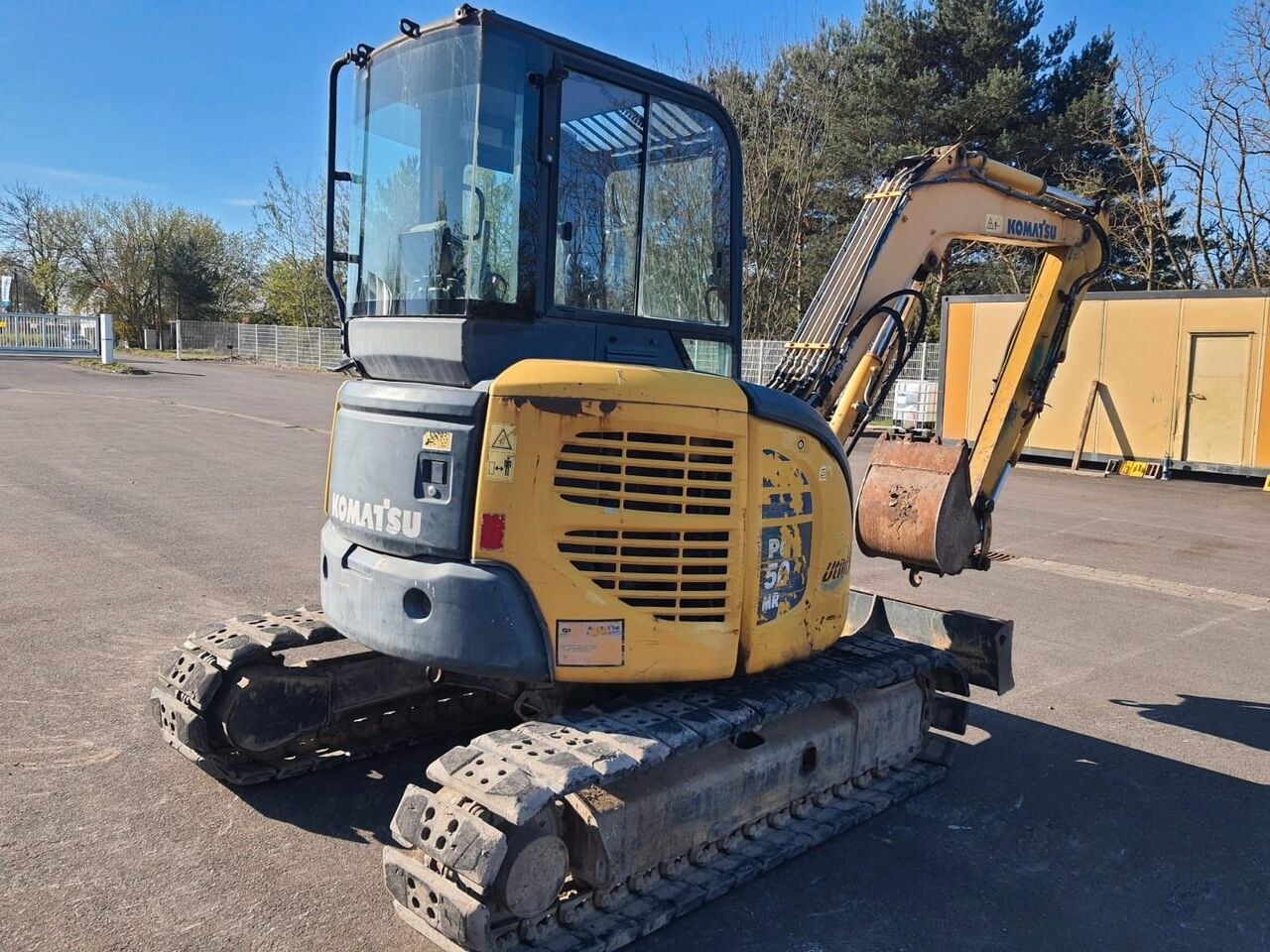 2010 Komatsu PC50MR-2 mini excavator, rear three-quarter view 2010 Komatsu PC50MR-2 mini excavator, rear three-quarter view