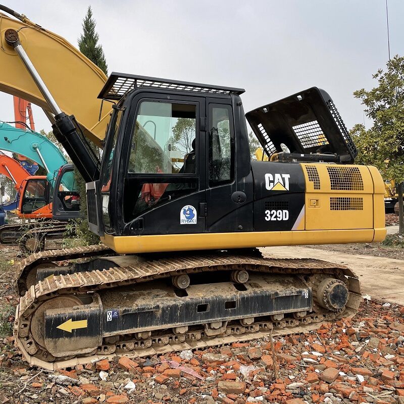 Caterpillar 329D crawler excavator, side view Caterpillar 329D crawler excavator, side view