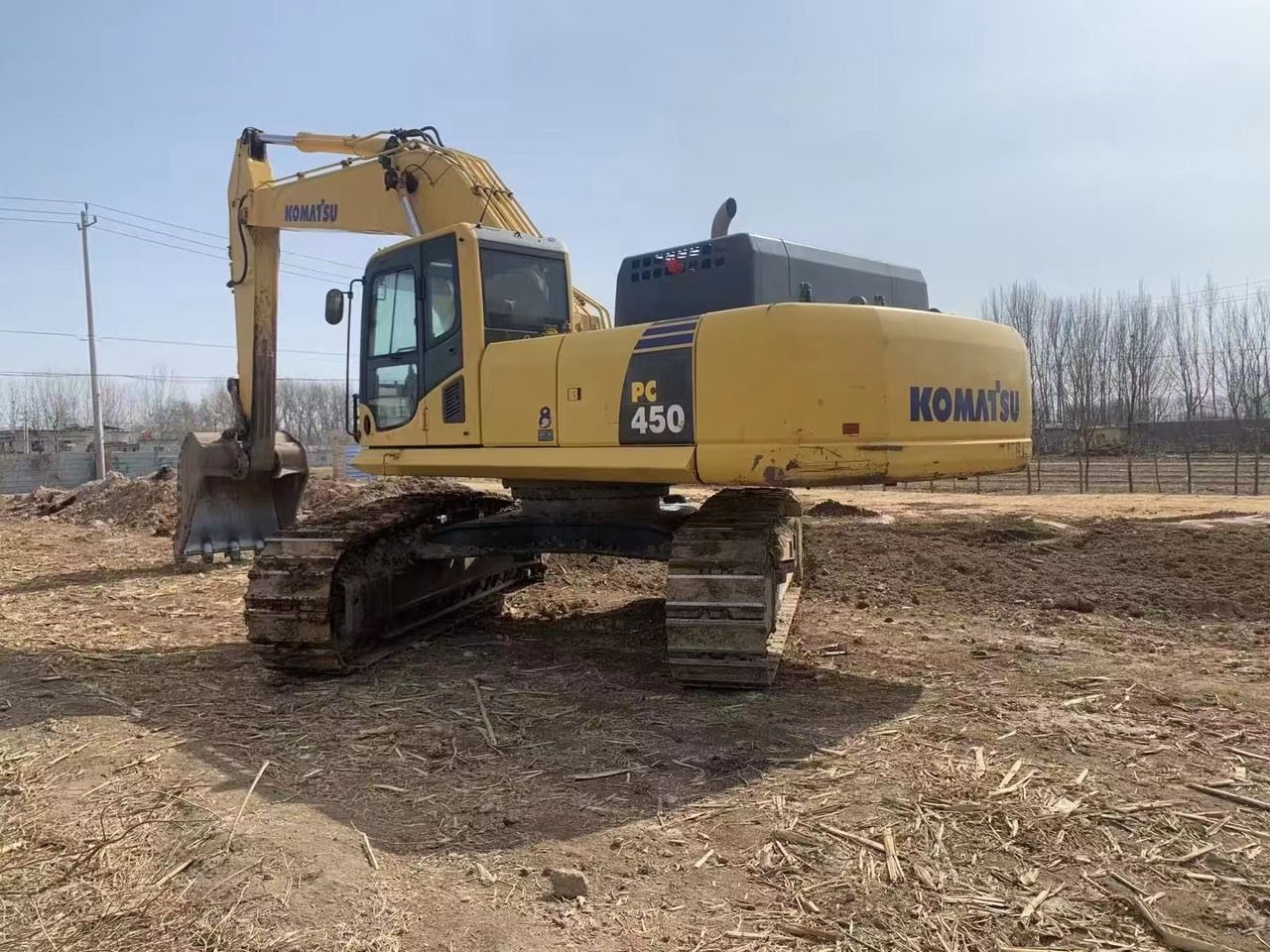 2020 Komatsu PC450 crawler excavator, rear three-quarter view 2020 Komatsu PC450 crawler excavator, rear three-quarter view