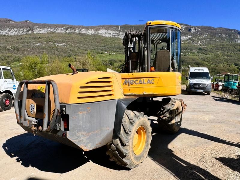 2008 Mecalac 12MXT wheel excavator rear three-quarter view 2008 Mecalac 12MXT wheel excavator rear three-quarter view