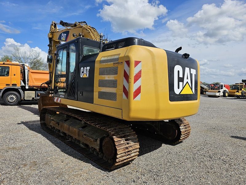 2015 Caterpillar 323EL crawler excavator, rear three-quarter view