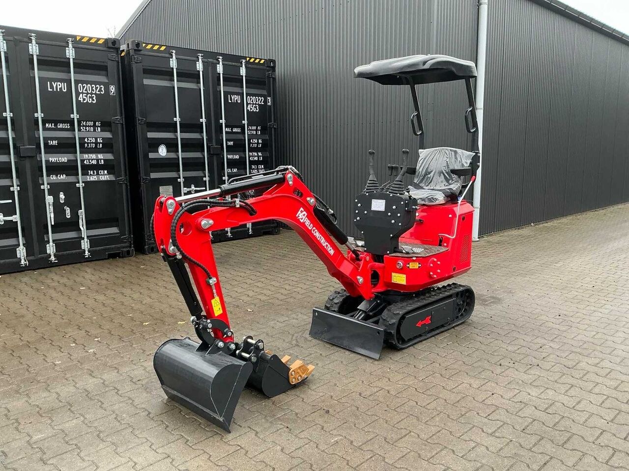 Field Construction HFT12 mini excavator, front three-quarter view Field Construction HFT12 mini excavator, front three-quarter view
