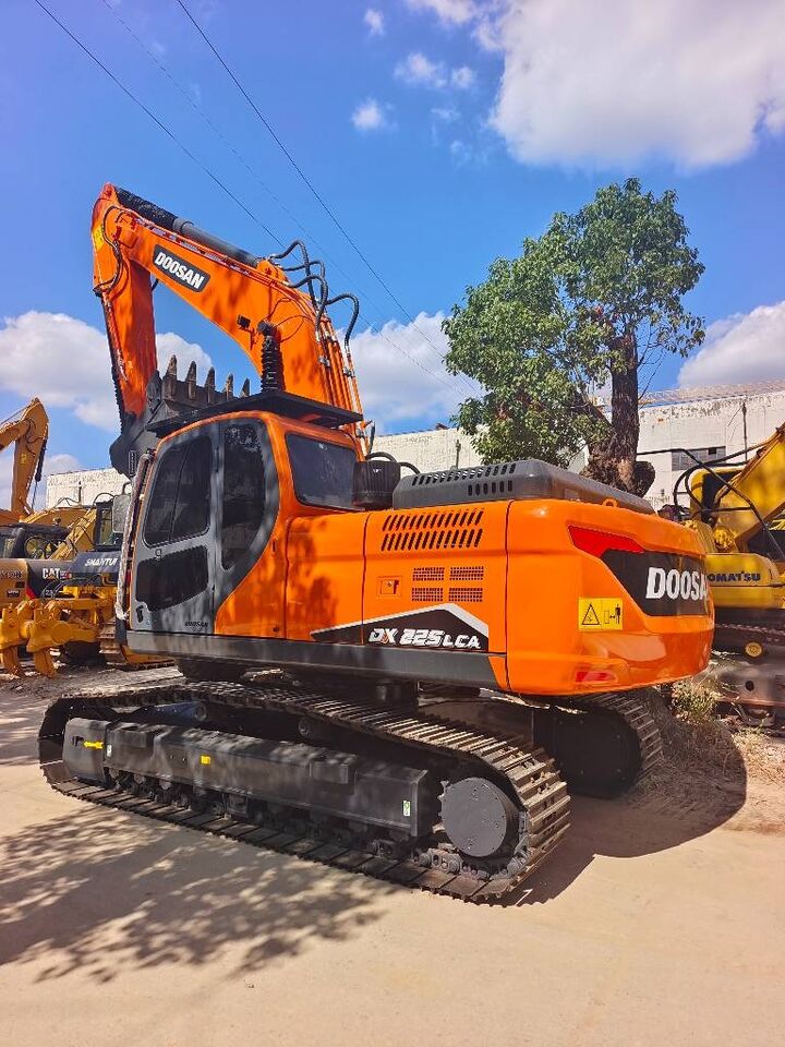 2024 Doosan DX225LCA crawler excavator, rear three-quarter view 2024 Doosan DX225LCA crawler excavator, rear three-quarter view