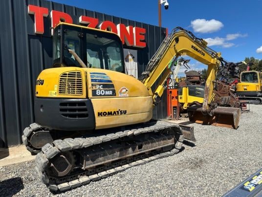 2011 Komatsu PC80MR-3 crawler excavator, rear three-quarter view 2011 Komatsu PC80MR-3 crawler excavator, rear three-quarter view