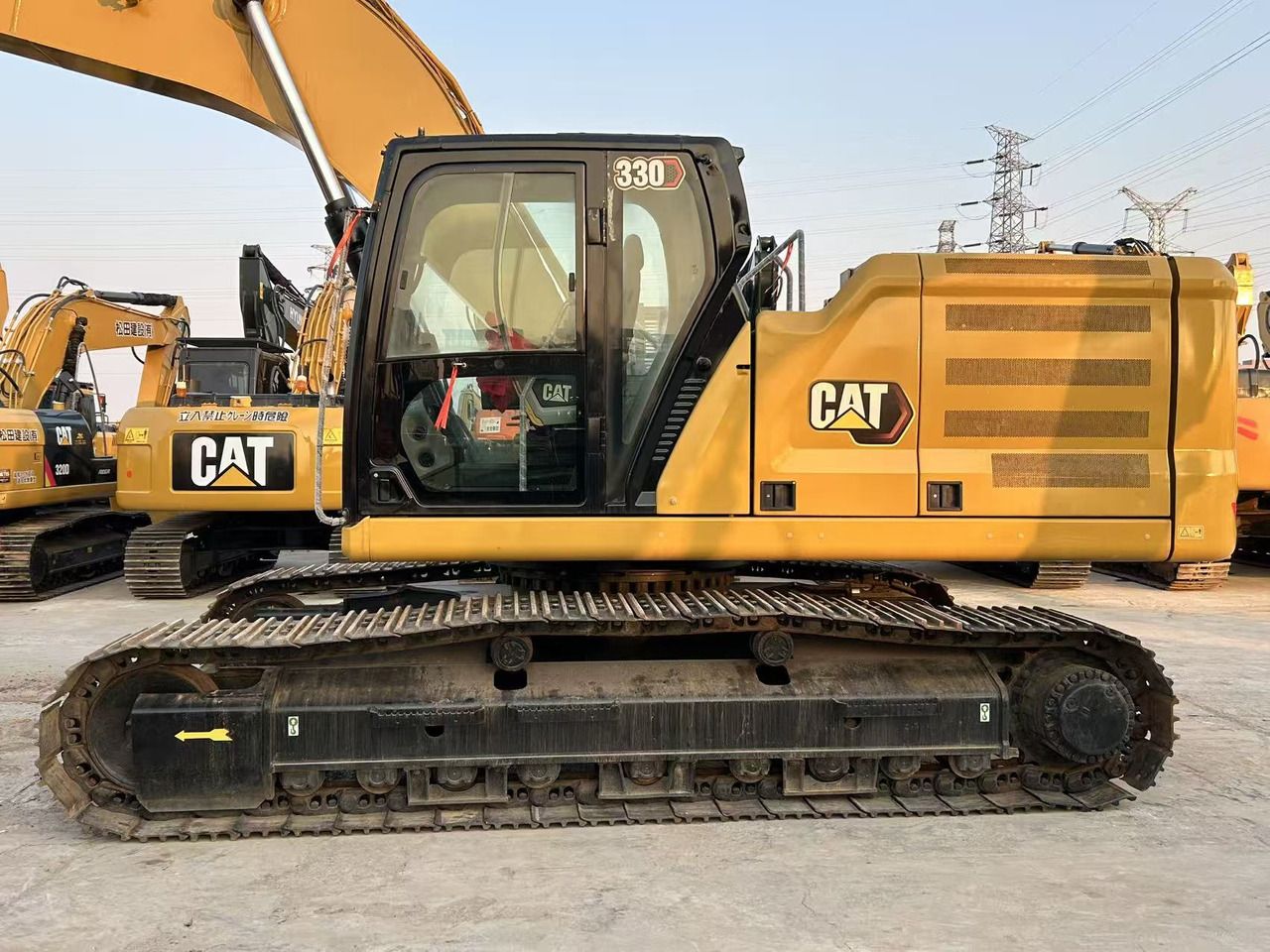 2023 Caterpillar 330 crawler excavator, side view 2023 Caterpillar 330 crawler excavator, side view