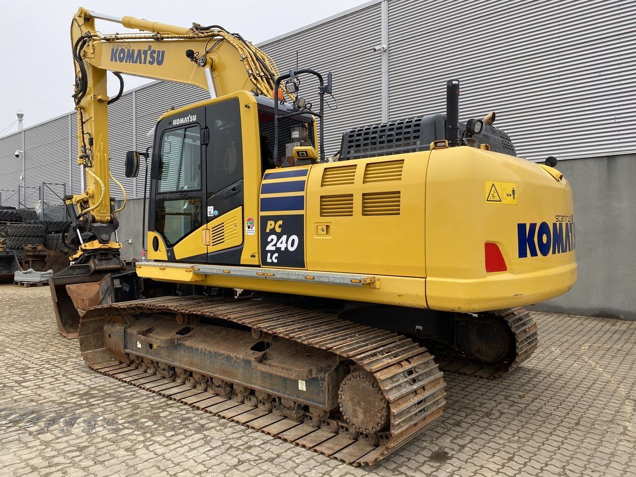 2021 Komatsu PC240LC-11 crawler excavator, rear three-quarter view 2021 Komatsu PC240LC-11 crawler excavator, rear three-quarter view