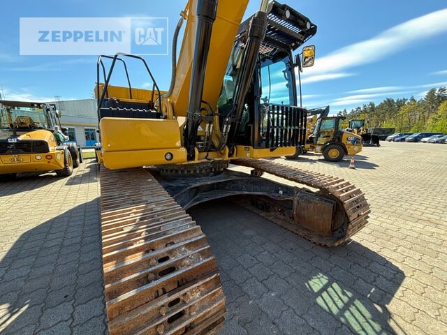 2023 Caterpillar 330-07 crawler excavator, low-angle side view 2023 Caterpillar 330-07 crawler excavator, low-angle side view