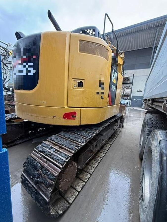 2016 Caterpillar 315FLCR crawler excavator, rear three-quarter view 2016 Caterpillar 315FLCR crawler excavator, rear three-quarter view