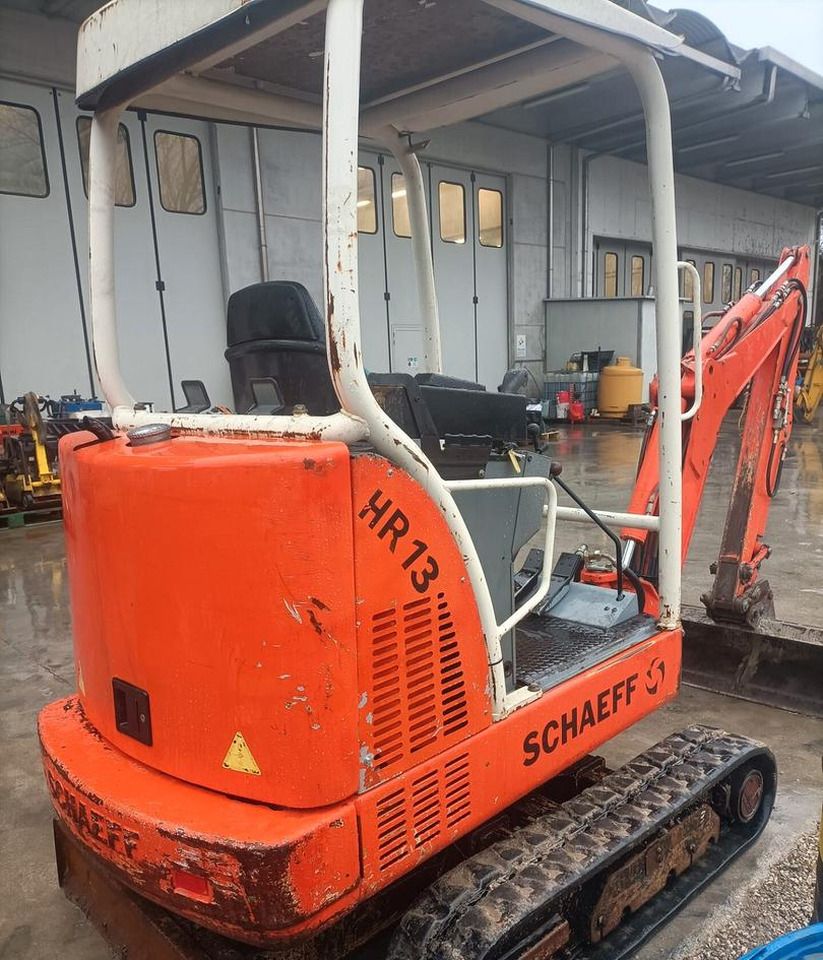 2001 Schaeff HR13 mini excavator, rear three-quarter view 2001 Schaeff HR13 mini excavator, rear three-quarter view