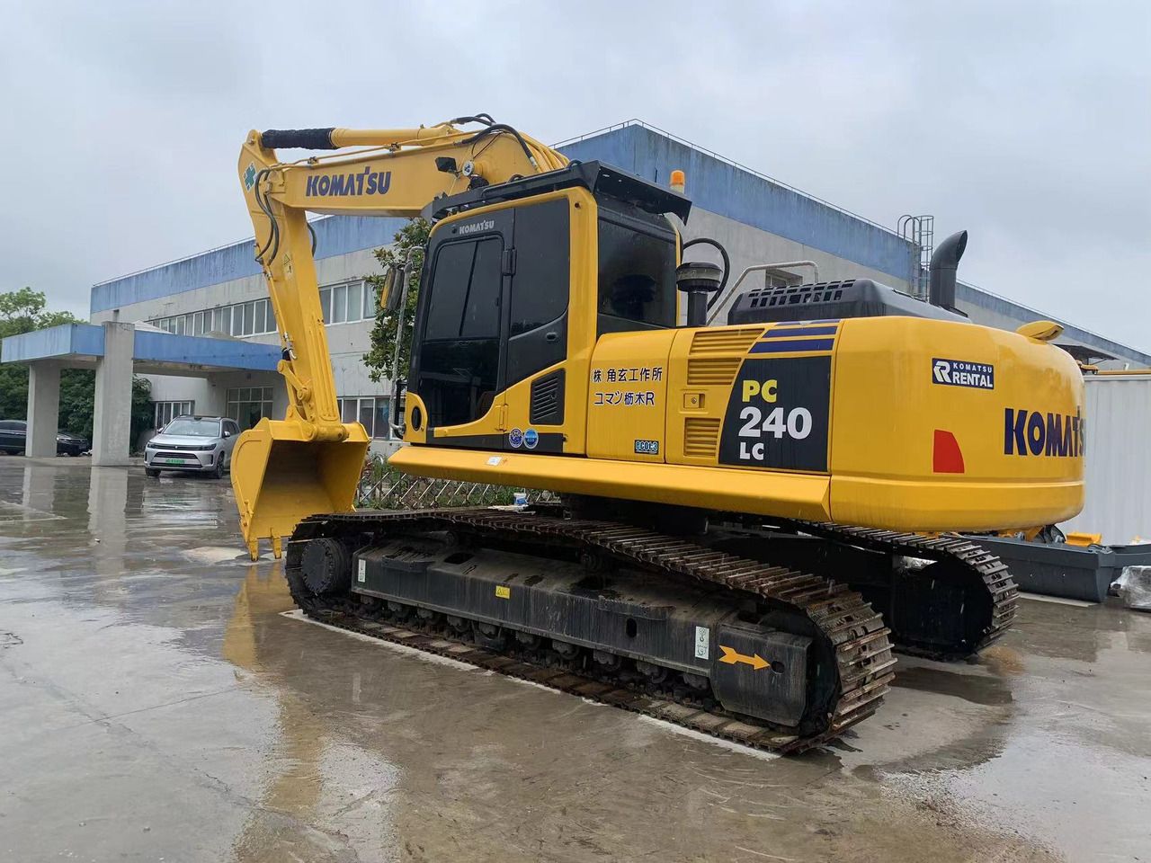 2023 Komatsu PC240LC-8 crawler excavator, rear three-quarter view 2023 Komatsu PC240LC-8 crawler excavator, rear three-quarter view