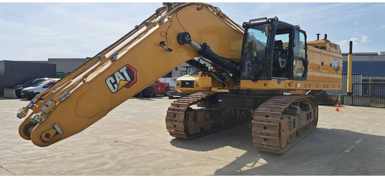 2021 Caterpillar 395-07 crawler excavator, front three-quarter view
