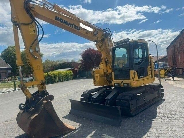 2016 Komatsu PC138US-11 crawler excavator, front three-quarter view 2016 Komatsu PC138US-11 crawler excavator, front three-quarter view
