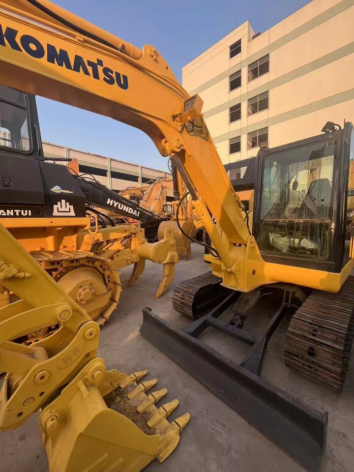 2019 Komatsu PC58-8 crawler excavator, front three-quarter view 2019 Komatsu PC58-8 crawler excavator, front three-quarter view