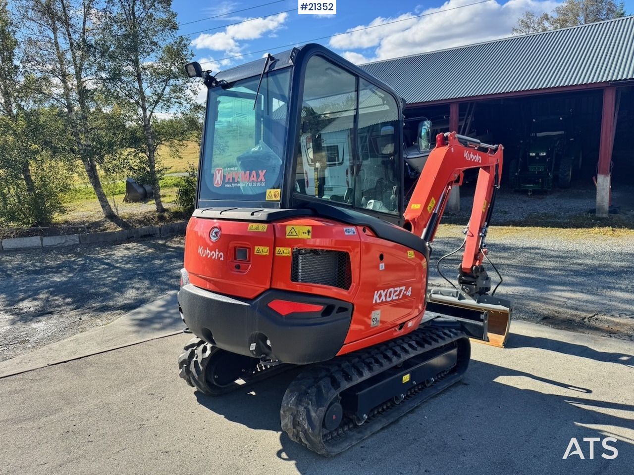 2022 Kubota KX027-4 mini excavator, rear three-quarter view 2022 Kubota KX027-4 mini excavator, rear three-quarter view