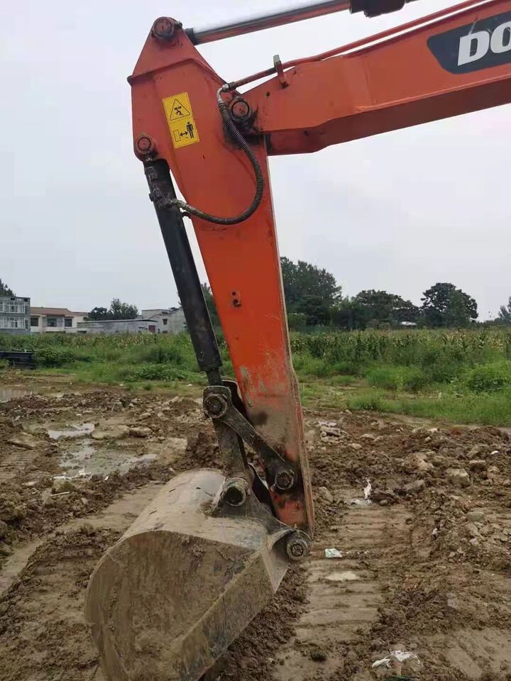 Doosan DX75-9C excavator boom and bucket detail Doosan DX75-9C excavator boom and bucket detail