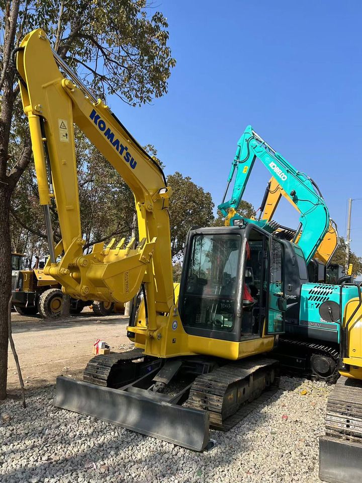 2022 Komatsu 56-7 crawler excavator, front three-quarter view