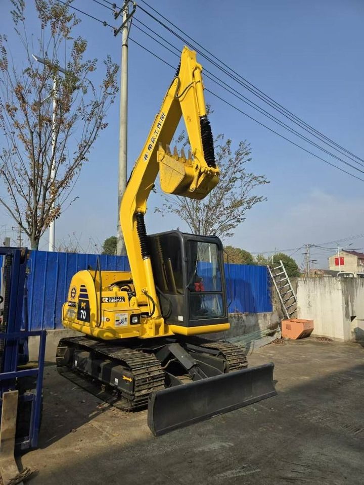 2024 Komatsu PC70 mini excavator, rear three-quarter view 2024 Komatsu PC70 mini excavator, rear three-quarter view