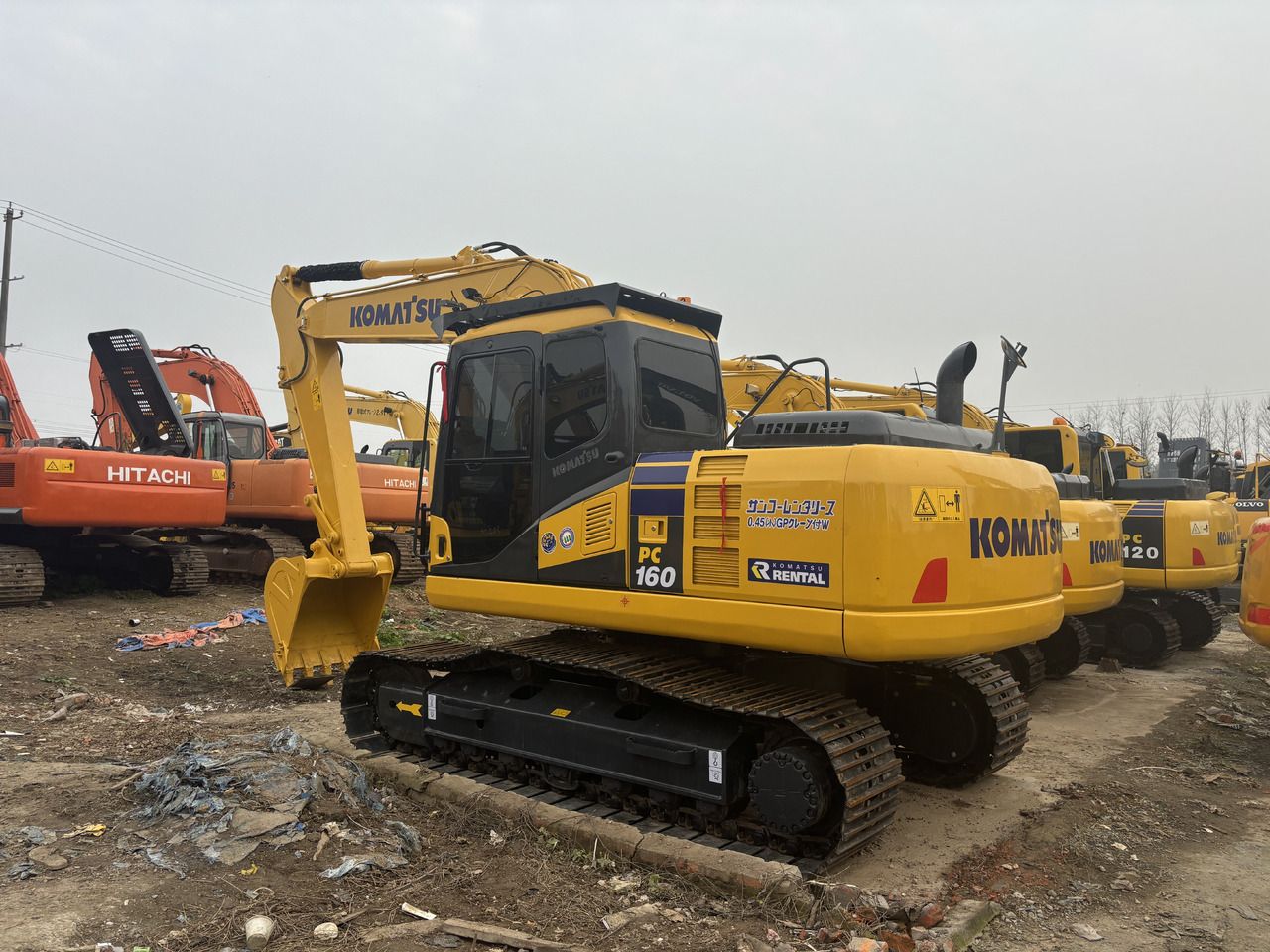 2022 Komatsu PC160 crawler excavator, rear three-quarter view 2022 Komatsu PC160 crawler excavator, rear three-quarter view